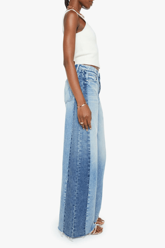 Pipe Dream Button Sneak Fray in Blinded By The Dark by MOTHER, Super high-rise rigid jeans with barrel-leg fit and frayed hem for vintage-meets-modern style.