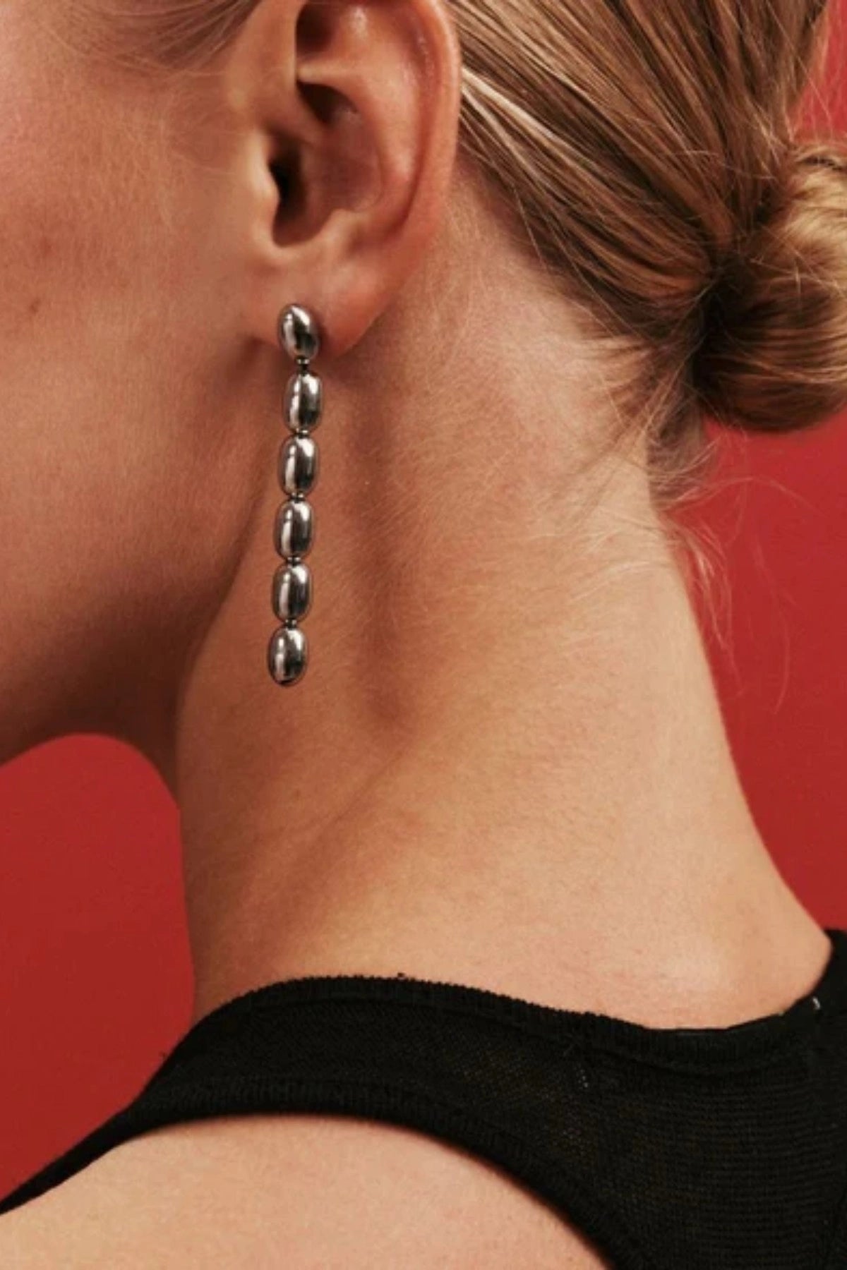 Edith Earrings in Silver by Heaven Mayhem – gold twisted-bead drop earrings with sculptural movement and shine, perfect for refined everyday styling.