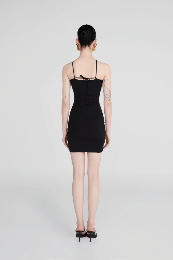 Coari Black by Maygel Coronel – Ruched cutout halter mini dress with 3D flowers and adjustable straps for versatile style.