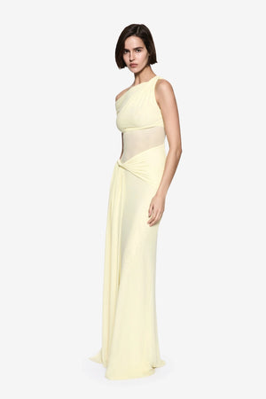 Sisal Mesh Dress by Misha, sheer lemon mesh with goddess-style draping and floor-length sash. Perfect for chic day-to-evening looks.