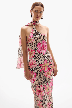 Hera Maxi Dress Safaria by Cin Cin – A trendy maxi blending vibrant floral and animal prints with a halter neckline and flowing silhouette. Perfect for resort wear and tropical events.
