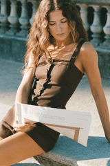 Corbiere Vest Bistre by Faithfull the Brand, sophisticated 100% European Flax® linen vest with wide straps, straight neckline, and mock buttons, perfect for trendy viral layering and elegant summer looks.