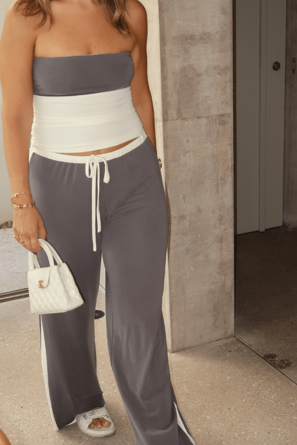 Hunter Tube Top Steel/Ivory by Sneaky Link – Sleek strapless top with contrast neckline and ruched sides. Perfect for trendy coordinated looks and viral summer vibes.