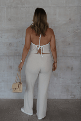 Charlie Pant Sand/White by Sneaky Link, trendy and comfortable low-rise pants with elastic waist and contrast drawcord, perfect for chic summer days and evenings.