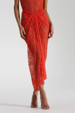Naomi Dress Tangerine by Natalie Rolt – A strapless lace dress with ruched knot detail and soft draping, perfect for summer weddings, garden parties, or sunset soirées.
