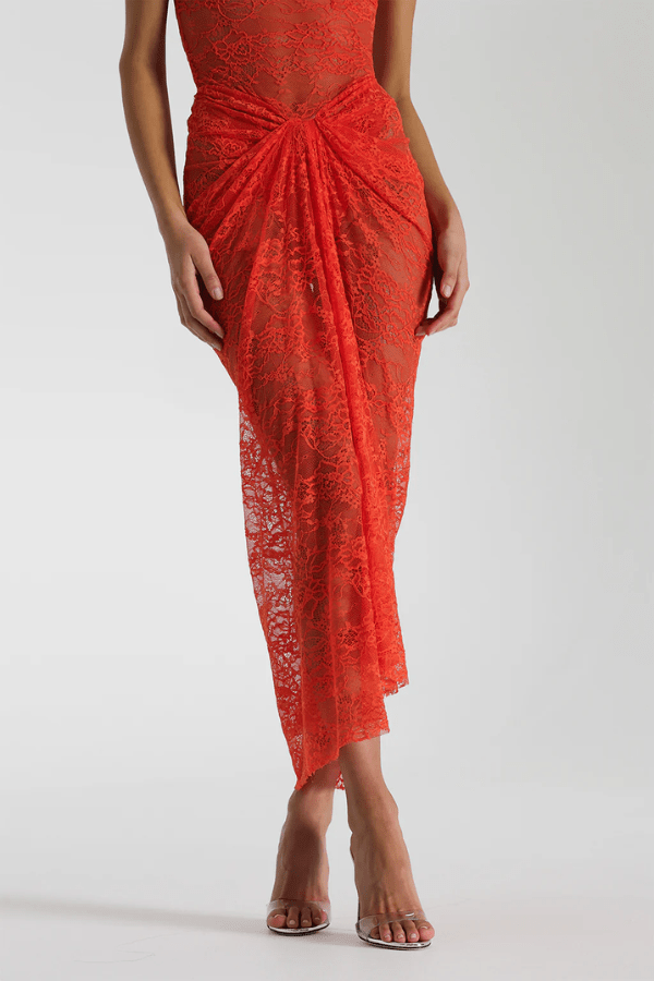 Naomi Dress Tangerine by Natalie Rolt – A strapless lace dress with ruched knot detail and soft draping, perfect for summer weddings, garden parties, or sunset soirées.