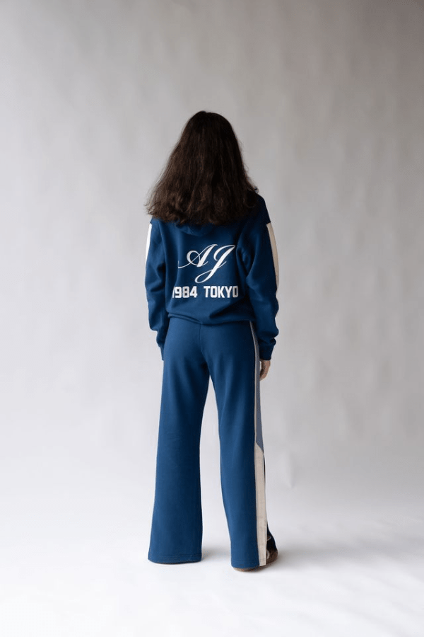 1993 Hoodie Estate Blue by Araminta James, soft cotton brushed fleece with contrast trim and velvet graphic, relaxed fit perfect for casual cool days.