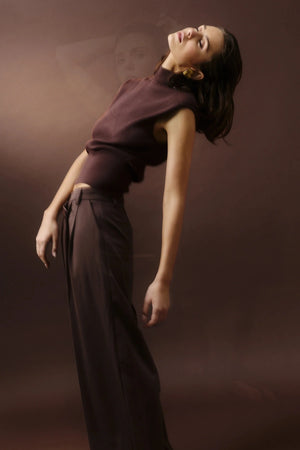 Quiet Force Top by Mossman in sky blue, ribbed sleeveless turtleneck with removable shoulder pads for sleek everyday styling.