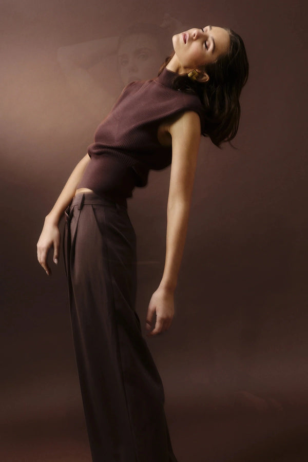 Quiet Force Top by Mossman in sky blue, ribbed sleeveless turtleneck with removable shoulder pads for sleek everyday styling.