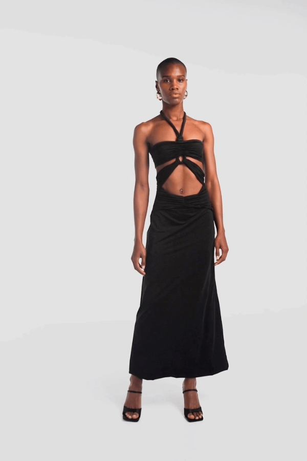 Migramah Black by Maygel Coronel – Draped dress with handmade knot, waist cutout, and shirred hips for flattering fit.