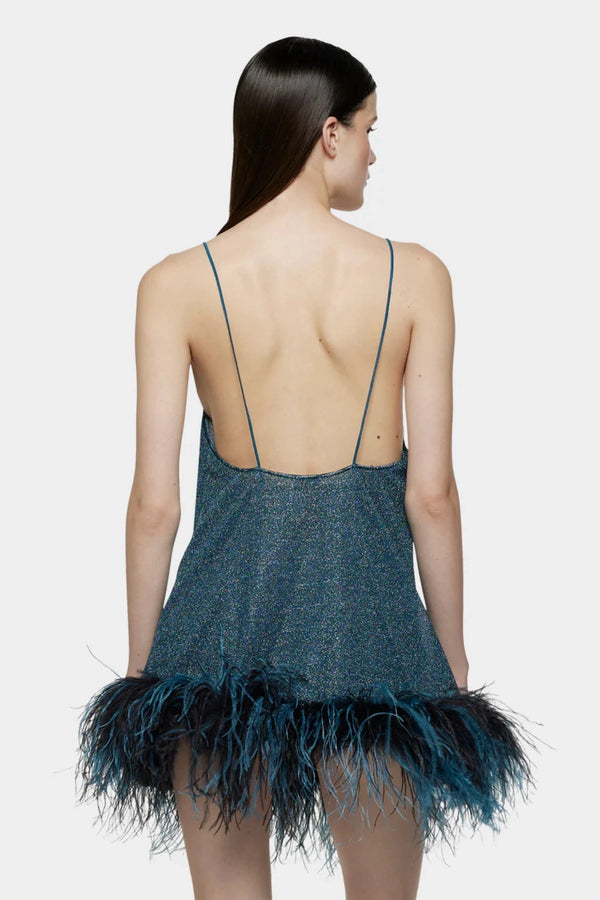 Lumière Plumage Short Dress Peacock by Oséree, a metallic mini with feather trim for a playful, glamorous evening look.
