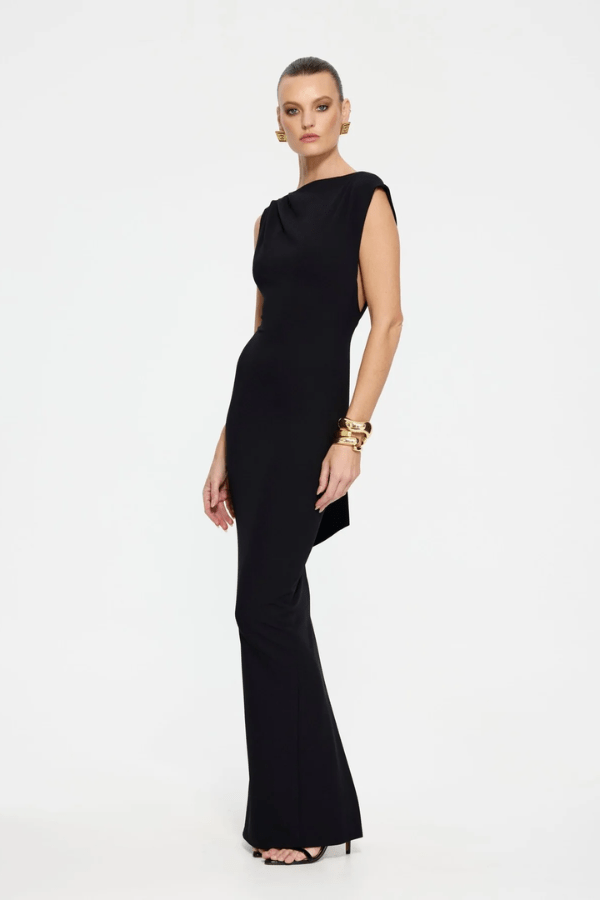 Audrey Gown Black by Effie Kats – A stretch-crepe gown with a straight neckline and dramatic low back, perfect for black-tie affairs, red carpet moments, or elegant evening events.