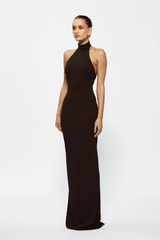 Rhi Gown Coffee by Effie Kats, a stretch crepe floor-length gown with high neck and open back. Perfect for timeless, elegant occasions.