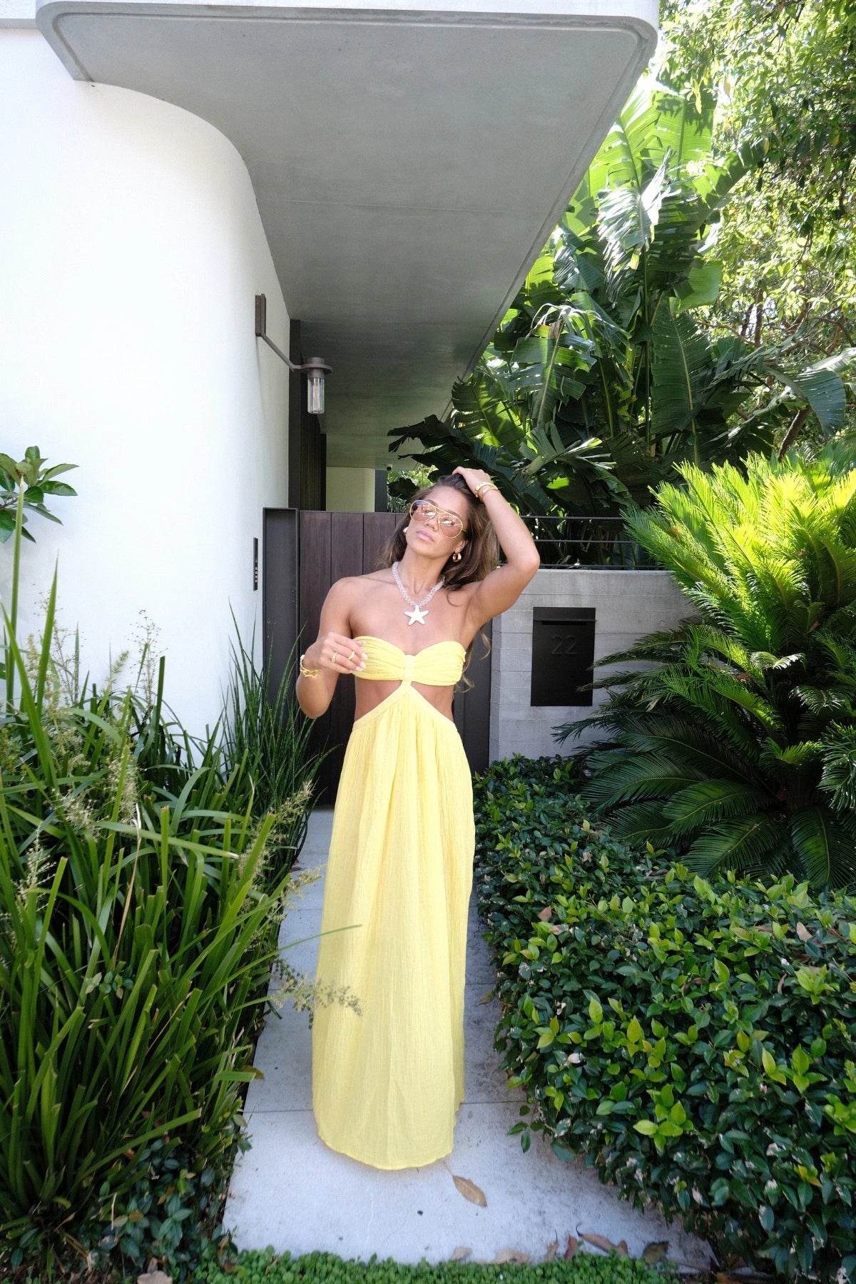 Chloe Dress Lemon by D'Artemide – Cotton strapless dress with ruched back, maxi skirt, side split, and low back detail.