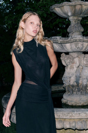Cassis Knot Maxi Dress by Bec and Bridge in black, featuring a high gathered neckline, sheer midsection, and knotted side detail. Perfect for events.
