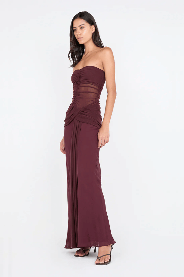 Noemi Strapless Dress by Bec + Bridge, sheer mesh bodice with twist drape detail. Perfect for weddings, galas, and evening occasions.