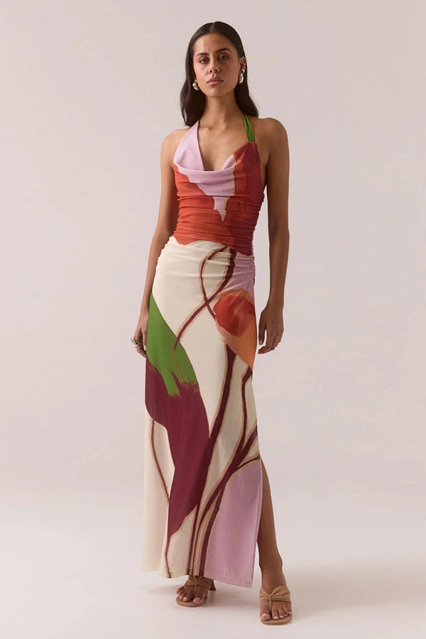 Kalea Dress – Botanic by Sovere, mesh halter-neck maxi with exclusive print and cowl neckline. Perfect for summer events.