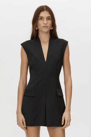 Houston Dress Black by Camilla and Marc – A sleek, sculpted mini with a bold V-neck and stand collar, featuring refined pockets and a seamless fit. Perfect for elevated evenings and chic events.