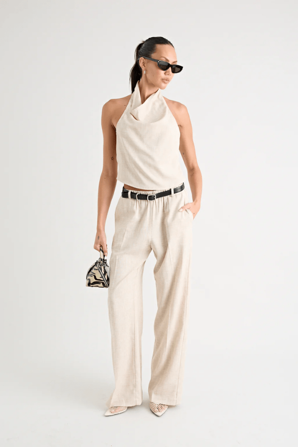 Pino Cowl Top Natural by Pfeiffer – Trendy, soft suiting top with adjustable cowl neckline and cinched back, perfect for chic day-to-night elegance.