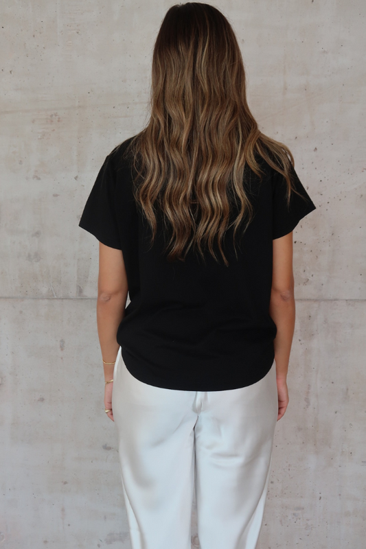 Black Tee by Sneaky Link – Trendy loose-fit 100% cotton classic black tee, a versatile essential for any capsule wardrobe and everyday casual looks.