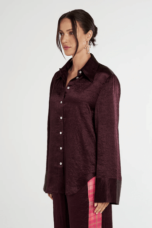 Cuff Shirt Plum by Summi Summi — Silky lightweight shirt with a structured collar and flared oversized cuffed sleeves. Crafted from 100% acetate woven fabric.