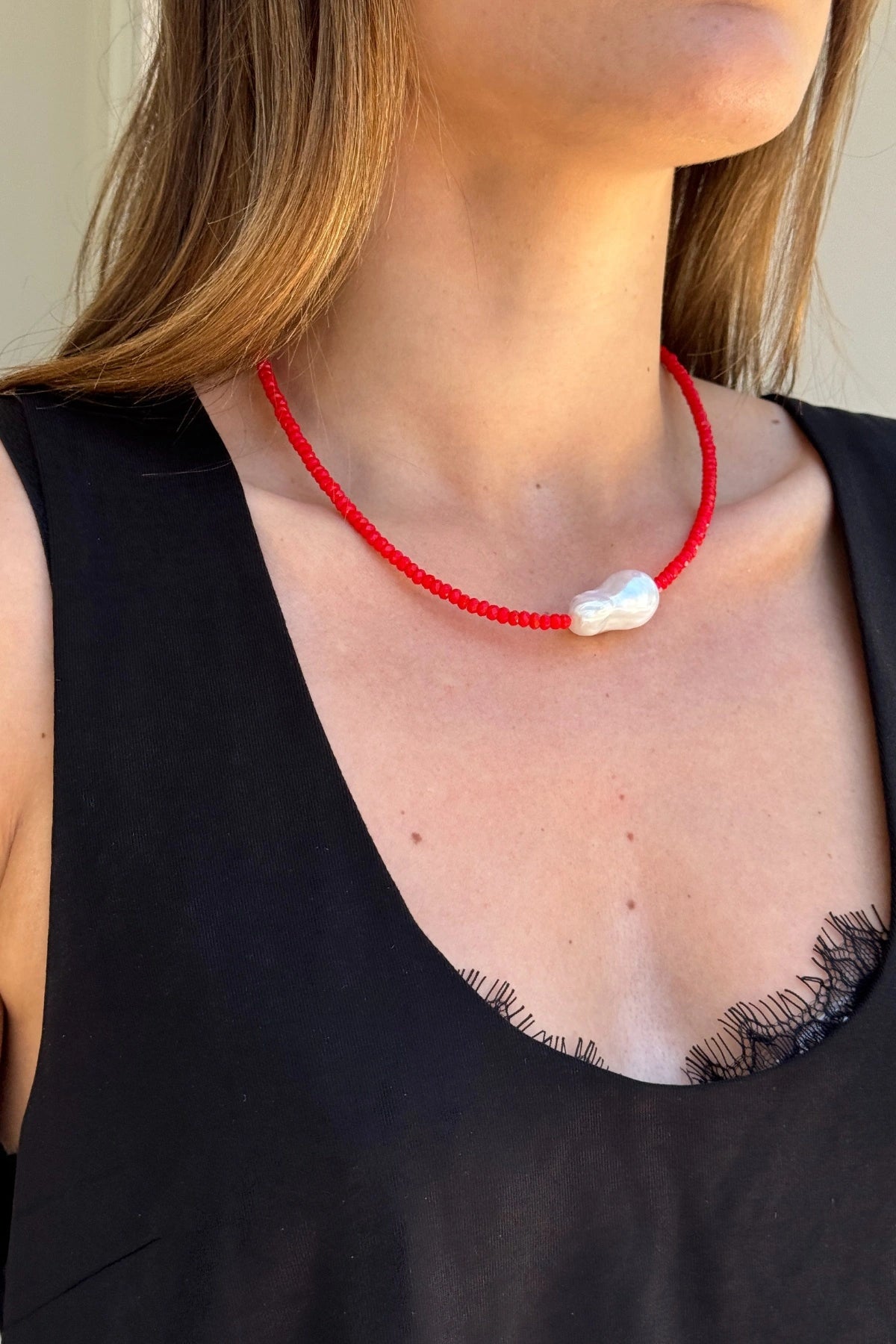 Toledo Necklace by Amber Sceats, handcrafted in Italy with red crystals, baroque freshwater pearl, and 24K gold plating for bold elegance.