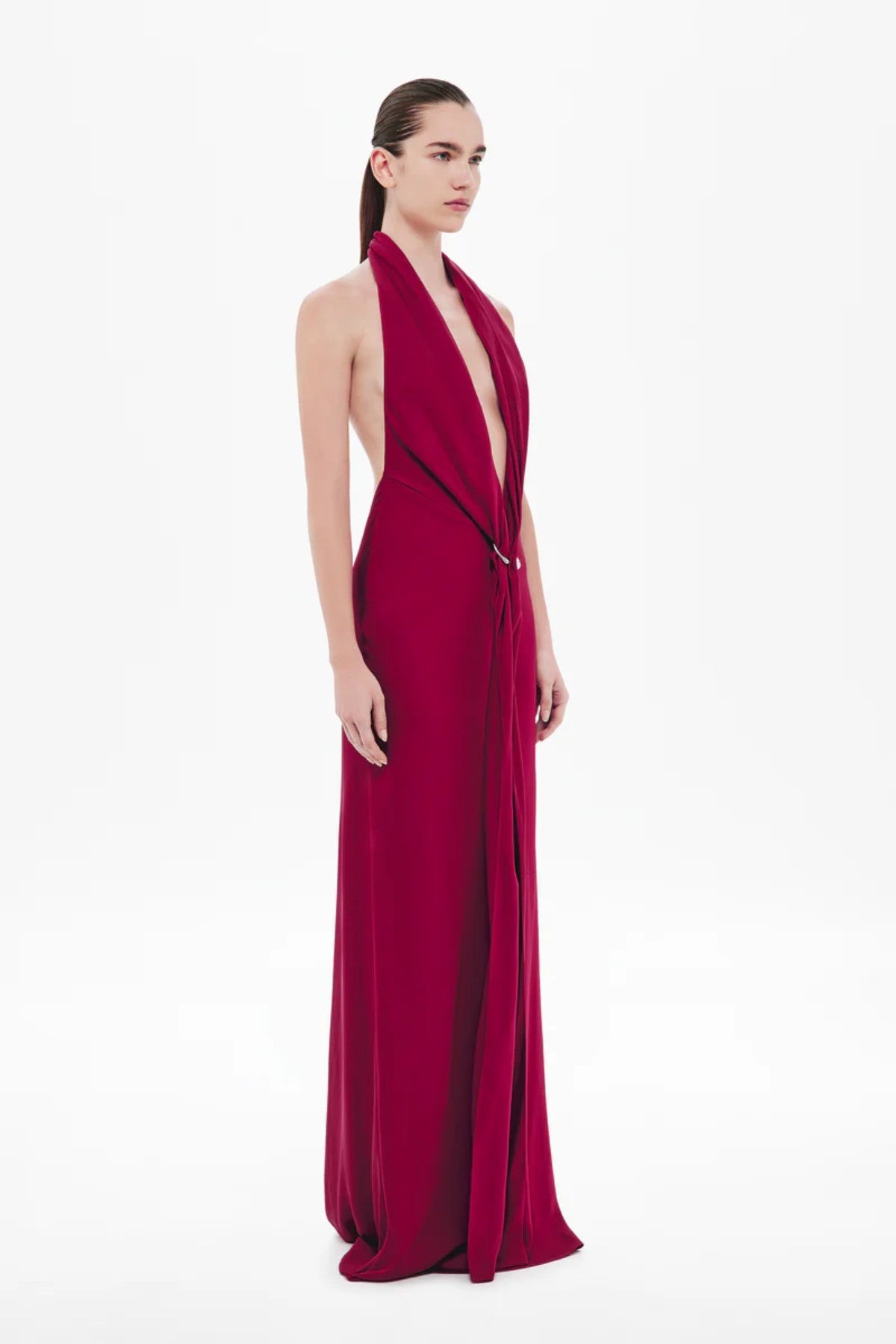 Donna Satin Dress in Jester Red by Misha, a plunging open-back gown with metallic ring detail and fluid draping for sultry sophistication.