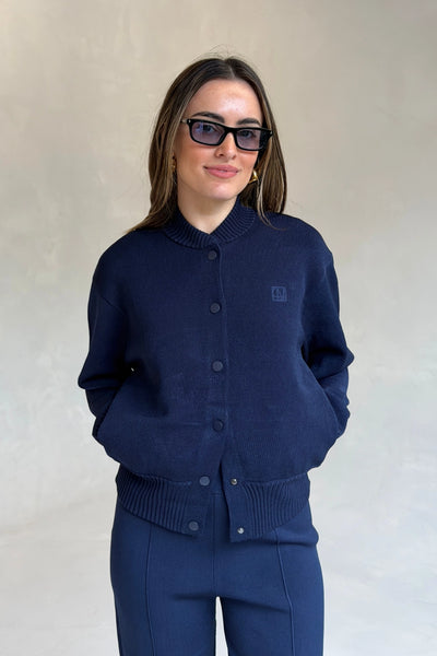Amedeo Knit Jacket Dark Navy by camilla and marc – bomber style knit jacket with embroidered monogram and concealed buttons.