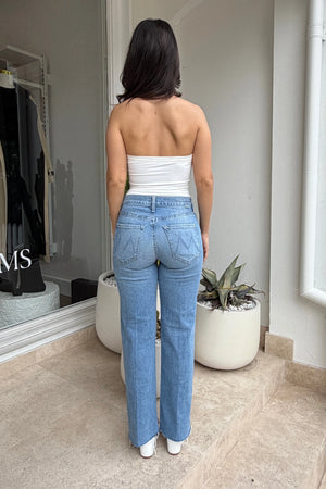 The Mid Rise Rambler Zip Ankle Fray Comeback Kid by MOTHER – mid rise straight leg jeans with frayed hem and faded wash.