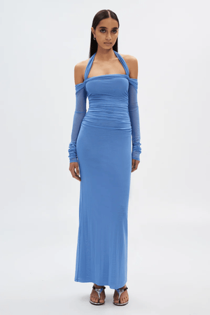 Sonnet Mesh Dress Cornflower Blue by Misha – A trendy off-shoulder, body-skimming maxi with halter neck strap and delicate gathers, perfect for sophisticated nights.