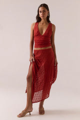 Aaila Lace Skirt – Blood Orange by Sovere, stretch lace midi with asymmetric hem and removable lining. Perfect for elevated looks.