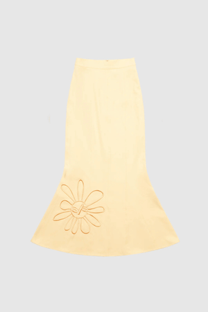 Inka Maxi Skirt Butter by The Wolf Gang, a flared godet midi with custom embroidery. Perfect for standout sets or sunny solo moments.