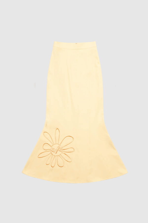 Inka Maxi Skirt Butter by The Wolf Gang, a flared godet midi with custom embroidery. Perfect for standout sets or sunny solo moments.