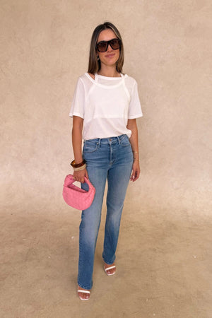 The Kick It Fan Favorite by MOTHER, trendy high-rise straight-leg jeans with a clean hem. Perfect for everyday wear with a mid-blue wash, subtle whiskering, and soft stretch denim for all-day comfort.