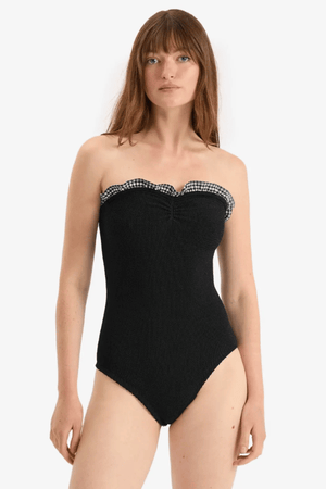 Dolly Bandeau Swimsuit Black by Hunza G – Strapless one-size swimsuit with ruched neckline and gingham texture for timeless poolside elegance.