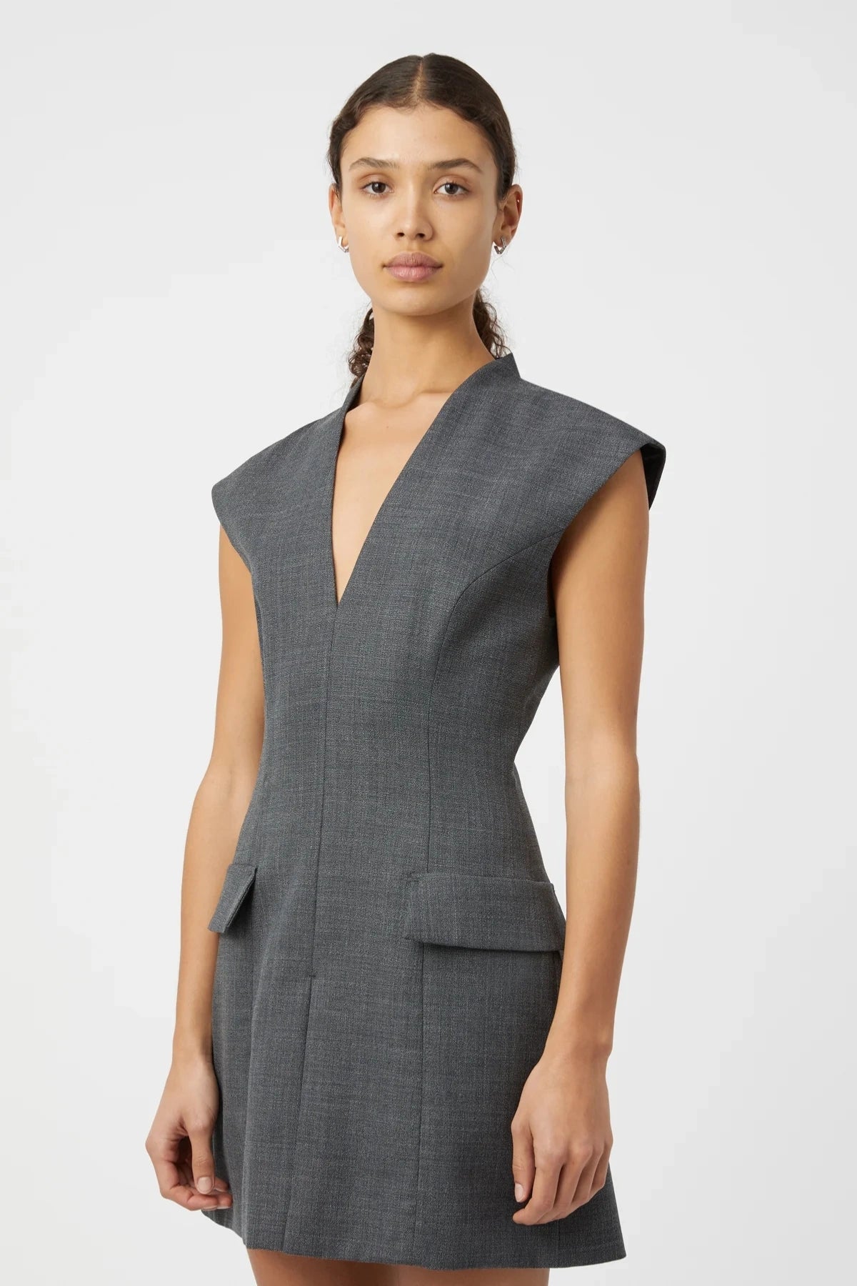 Seidler Mini Dress Dark Charcoal by Camilla and Marc – Trendy wool mini with deep V-neckline, front box pleat, and side pockets, perfect for refined daywear and polished evening looks.