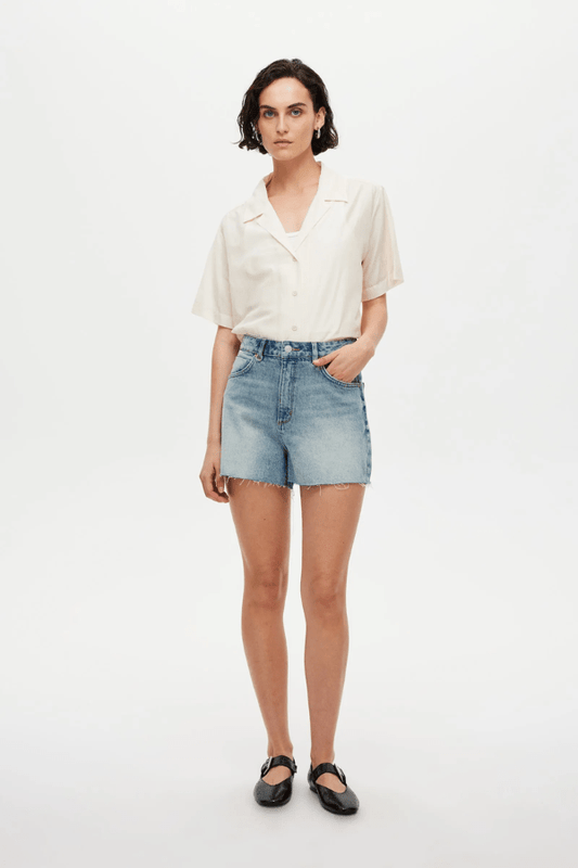 Ryder Short Cosmic by Neuw Denim, a trendy high-rise short with a flattering silhouette, contrast stitching, and signature repair stitch. Perfect for all-season, sustainable style.