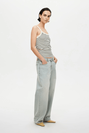 Yoko Relaxed Before Sunset by Neuw Denim, a trendy low-waisted jean with an exaggerated rise, designed to be worn slung low or belted for a tailored look, perfect for casual, contemporary style.