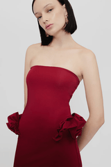 Calliope Dress Carmesi by Maygel Coronel – Strapless maxi dress with waist ruffles in iconic stretch fabric; bold, sleek, and sun-ready.