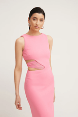 Valentina Dress Rouge Pink by Tojhà – A bold and sleek maxi with a boat neckline and unique waist cut-out, perfect for elegant evenings and special events.