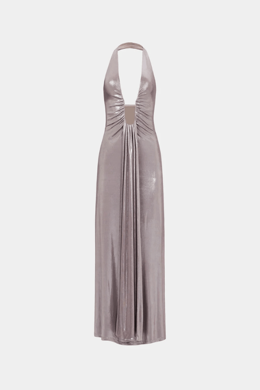 Jennifer Foil Jersey Dress Cinder by Misha – Trendy slim-fit maxi with deep V halter neckline, gathered waist, and cascading sash, perfect for glamorous day-to-evening occasions.