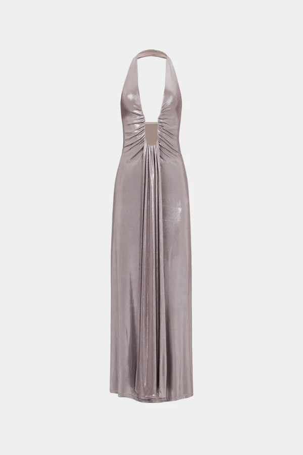 Jennifer Foil Jersey Dress Cinder by Misha – Trendy slim-fit maxi with deep V halter neckline, gathered waist, and cascading sash, perfect for glamorous day-to-evening occasions.