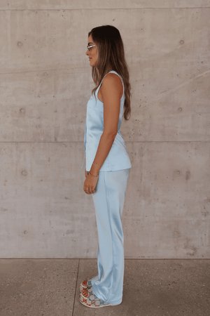 Maja Vest Blue by Sneaky Link – Trendy double-lined satin vest with a chic square neckline and adjustable drawstring back, perfect for polished day or night looks.