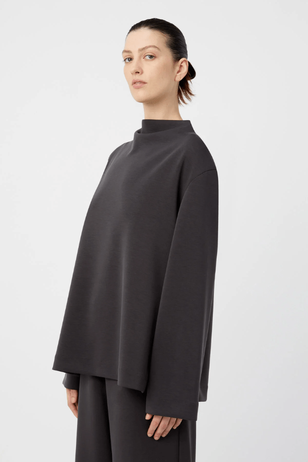 Elanora Long Sleeve Lounge Top Amethyst by Camilla and Marc – Soft high-neck lounge top with side splits, silicone monogram, and blind hems.