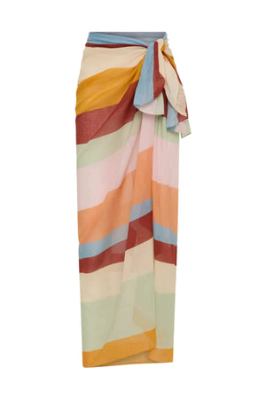 Square Pareo in Iris by Soleil Soleil, a versatile organic cotton wrap or scarf with rainbow-hued stripes, perfect for relaxed resort days.