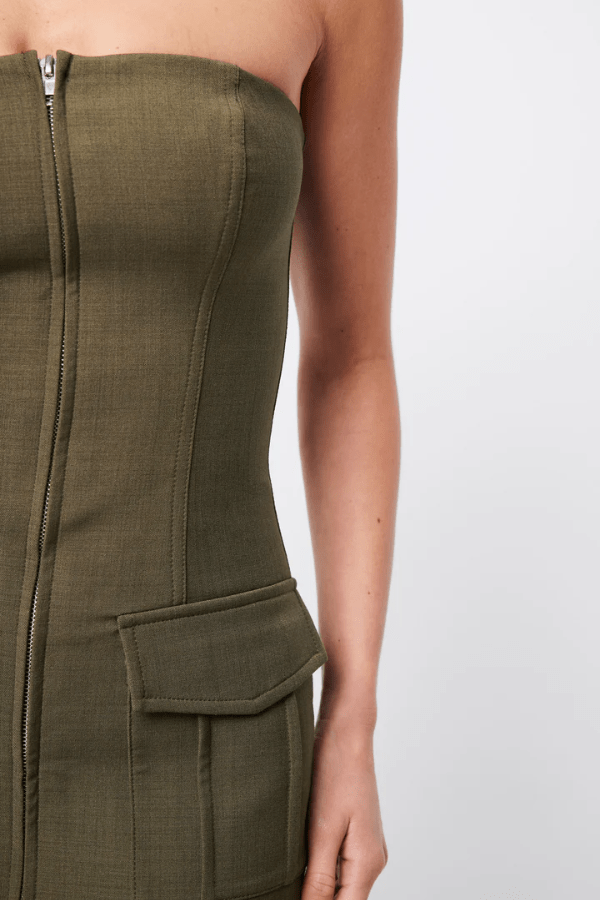 Low Profile Midi Dress Khaki by Mossman – A chic, strapless utility-inspired midi with exposed zip, front pockets, and back split, perfect for modern, versatile styling.