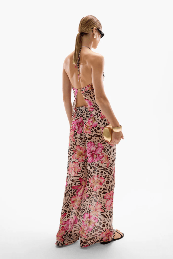 Coral Orchid Drape Top Safaria by Cin Cin – Lightweight 100% viscose with vibrant florals and animal print. Adjustable halter tie and gold clasp. Perfect for summer.