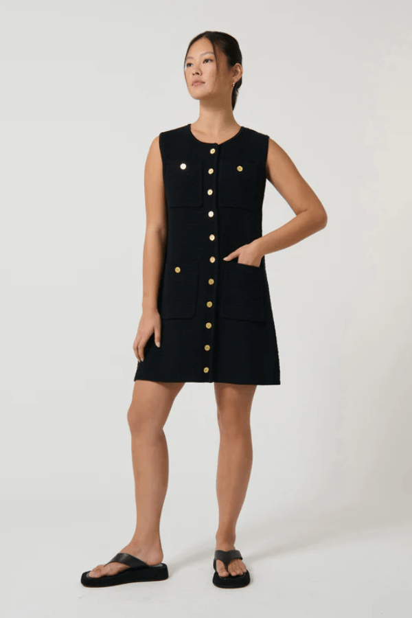 Helena Dress Black by Onte – A trendy, breathable 100% cotton crochet-style gilet with gold buttons and patch pockets, perfect for chic layering and casual elegance.