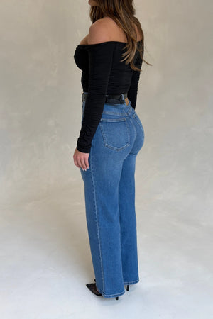 Celine High Rise Stretch Jean Indigo by Sneaky Link, high-stretch sculpting denim with a clean flare, elongating legs perfectly.