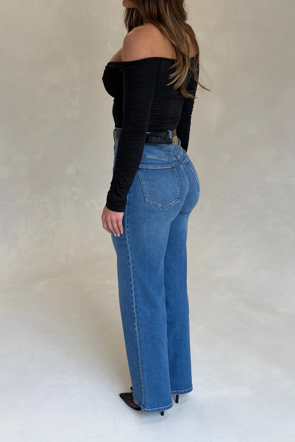 Celine High Rise Stretch Jean Indigo by Sneaky Link, high-stretch sculpting denim with a clean flare, elongating legs perfectly.